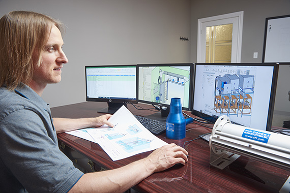 Engineer drafting custom system